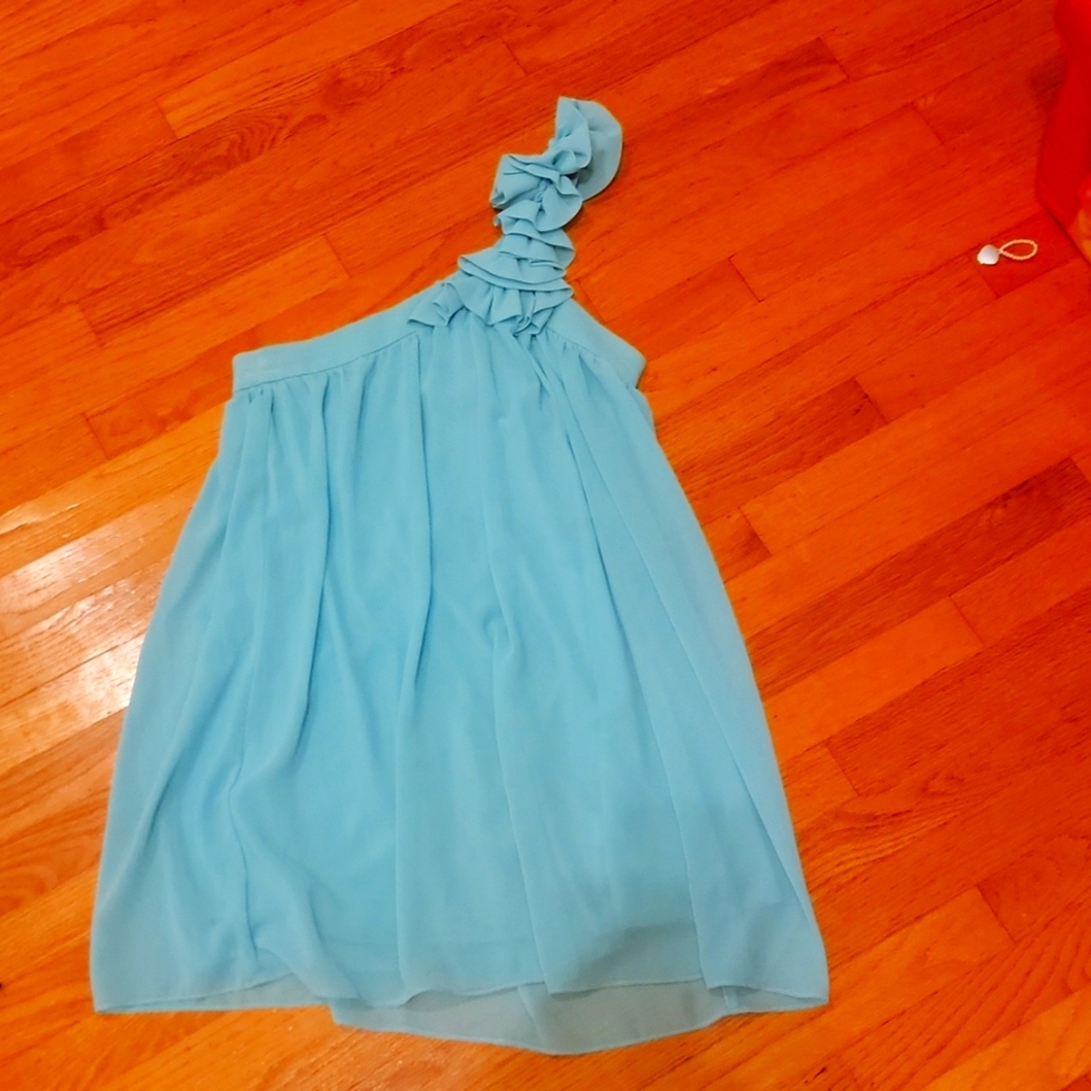 One shouldered aqua colored dress with beautiful ruffles on the strap.